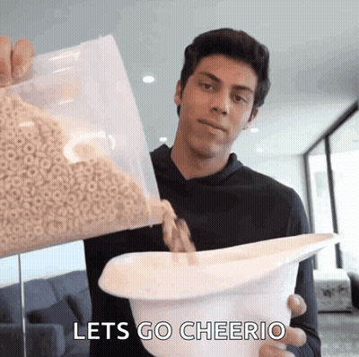 Man Pouring Cereal Saying Let's Go Cheerio GIF