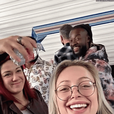 Man Pouring Water Into Woman's Bottle GIF