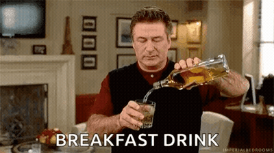 Man Pouring Whiskey Into Glass GIF
