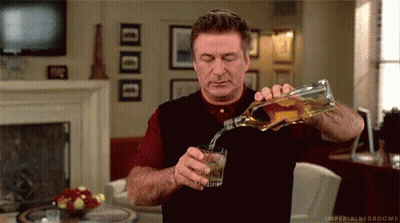 Man Pouring Whiskey Into Glass GIF