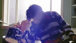 Man Practicing Rimshot In The House GIF