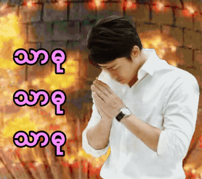 Man Praying In Front Of Fire GIF