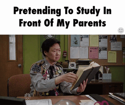 Man Pretending To Read Book In Front Of Parents GIF