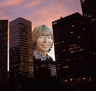 Man Projected On Building With Number 1666 GIF