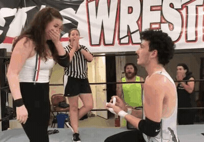 Man Proposing To Woman In Wrestling Ring GIF