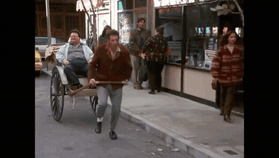 Man Pulling Horse-Drawn Carriage GIF