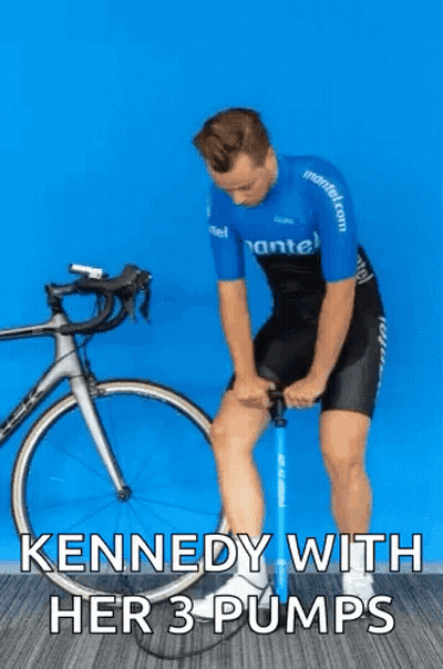 Man Pumping Bicycle Tire Kennedy With Her 3 Pumps GIF
