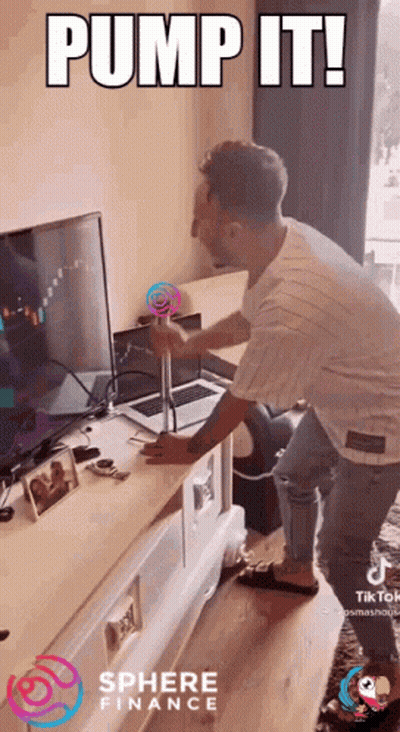 Man Pumps Lollipop In Front Of Computer With Sphere Finance Logo GIF