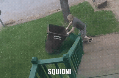 Man Pushing Garbage Can With Squidni GIF