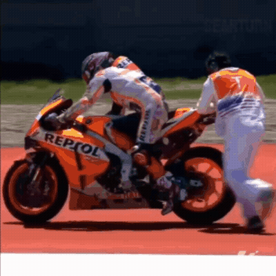 Man Pushing Motorcycle With Repsol GIF