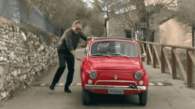 Man Pushing Red Car With Plate 2515 Jm - Gm GIF