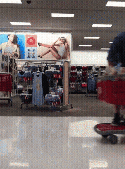Man Pushing Shopping Cart In Target GIF