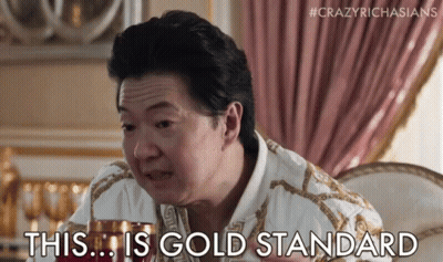 Man Puts Ring On Woman's Finger, Another Watches GIF