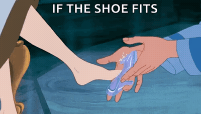 Man Putting Shoe On Woman's Foot GIF