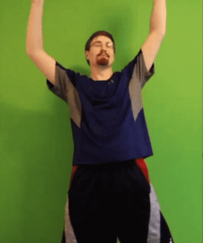 Man Raising Arms Blue Shirt Black Shorts GIF