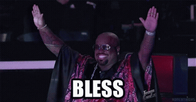 Man Raising Arms Wearing Bless Shirt GIF
