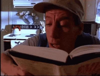 Man Reading Coca-Cola Book GIF