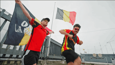 Man Red Shirt Holding Flag On La Pa GIF