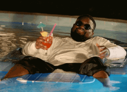 Man Relaxing In Pool GIF