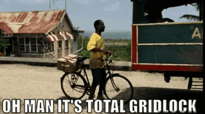 Man Riding Bike Saying Oh Man It's Total Gridlock GIF