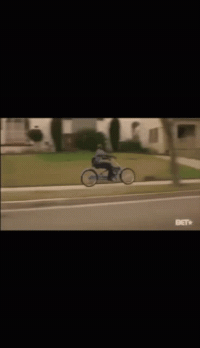 Man Riding Blue Bicycle GIF