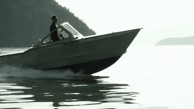 Man Riding Boat With NC License Plate GIF