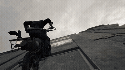 Man Riding Dirt Bike Down Concrete Wall GIF