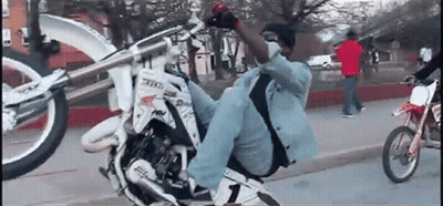 Man Riding Dirt Bike With Number 1 GIF