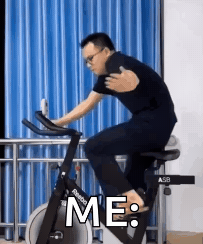 Man Riding Exercise Bike Saying Me GIF