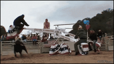Man Riding Flying U Rodeo and Man on Seesaw