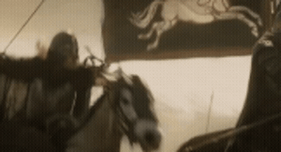 Man Riding Horse In Black And White GIF