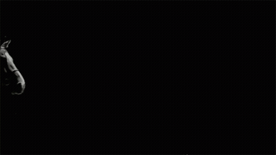 Man Riding Horse In Black And White GIF