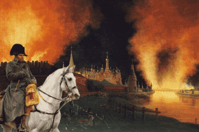 Man Riding Horse In Front Of Burning Building GIF