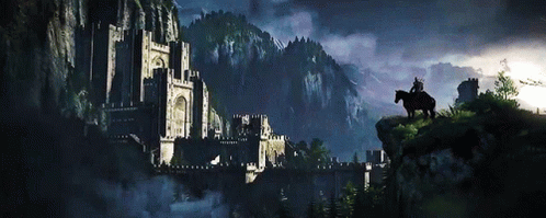 Man Riding Horse Near Castle GIF