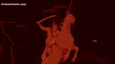 Man Riding Horse With Sword GIF