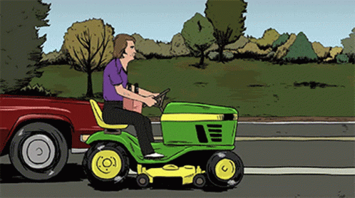 Man Riding John Deere Lawn Mower On Road GIF
