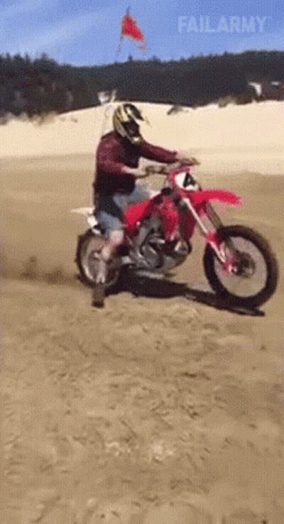 Man Riding Motorcycle Down Highway Black And White GIF