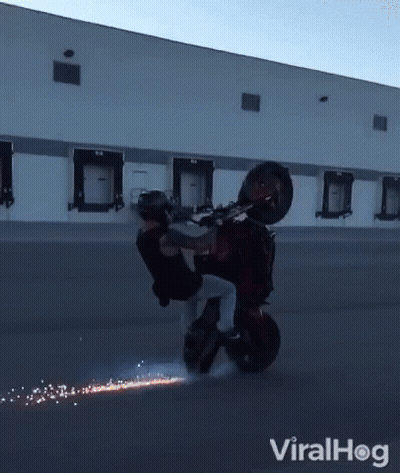 Man Riding Motorcycle In Front Of Building With Viralhog GIF