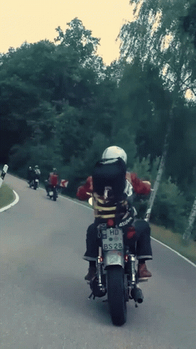 Man Riding Motorcycle License Plate HD BS28 GIF