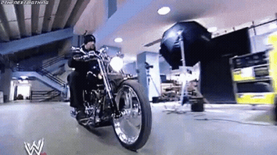 Man Riding Motorcycle With Camera GIF