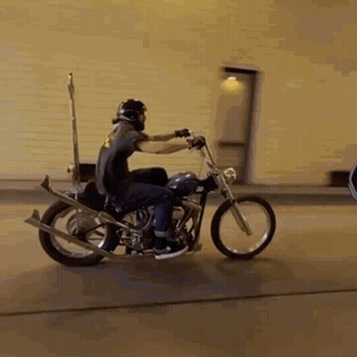 Man Riding Motorcycle With Helmet GIF