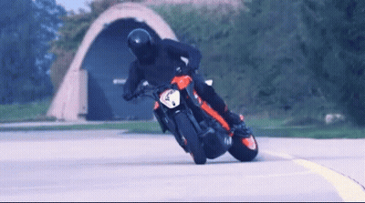 Man Riding Motorcycle With Number 4 GIF