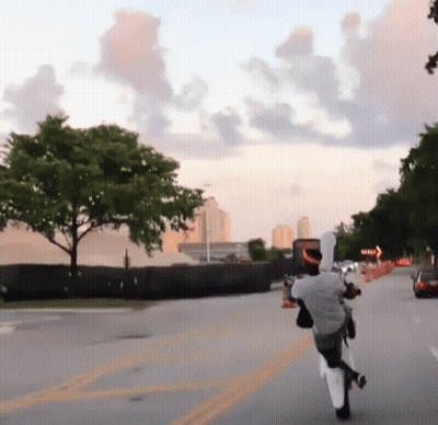 Man Riding Motorcycle With Right Arrow GIF