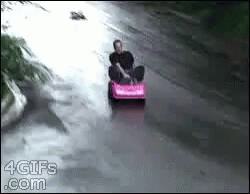 Man Riding Pink Toy Car With 4Gifs.com GIF