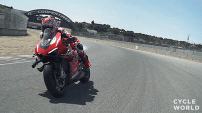 Man Riding Red Motorcycle With Coopertires Sign GIF
