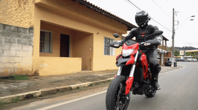 Man Riding Red Motorcycle GIF