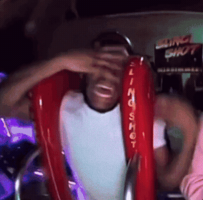 Man Riding Red Slingshot Ride GIF