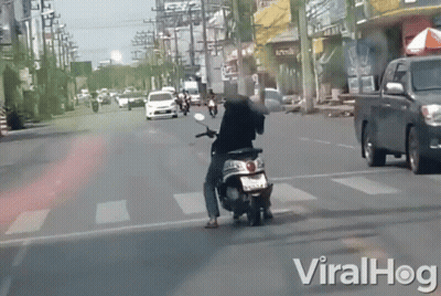 Man Riding Scooter Viralhog GIF