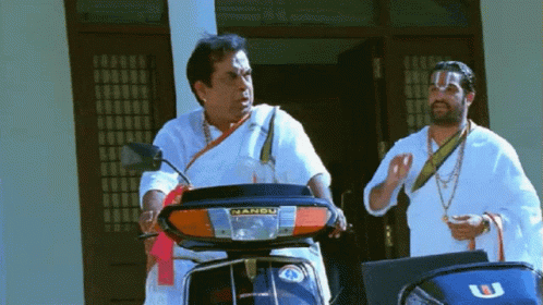 Man Riding Scooter With Nanda GIF