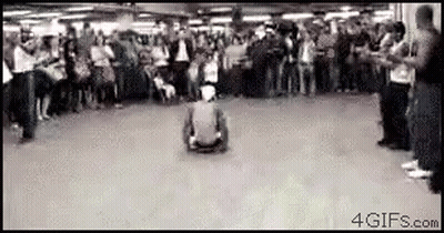 Man Riding Skateboard In Front Of Crowd GIF